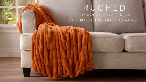 Dunelm orange online throw